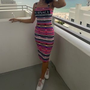 “Versace” bodycon dress size Small but could fit a medium it was little loose